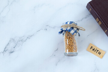 Mustard seeds in bottle with handwritten word 