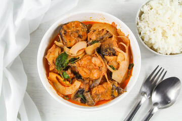 Red curry with catfish and preserved bamboo shoot,  Red curry with coconut milk, Thailand tradition red curry soup.