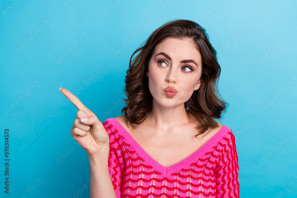 Sticker photo of charming classy girl pouted lips directing finger look empty space information choosing bes