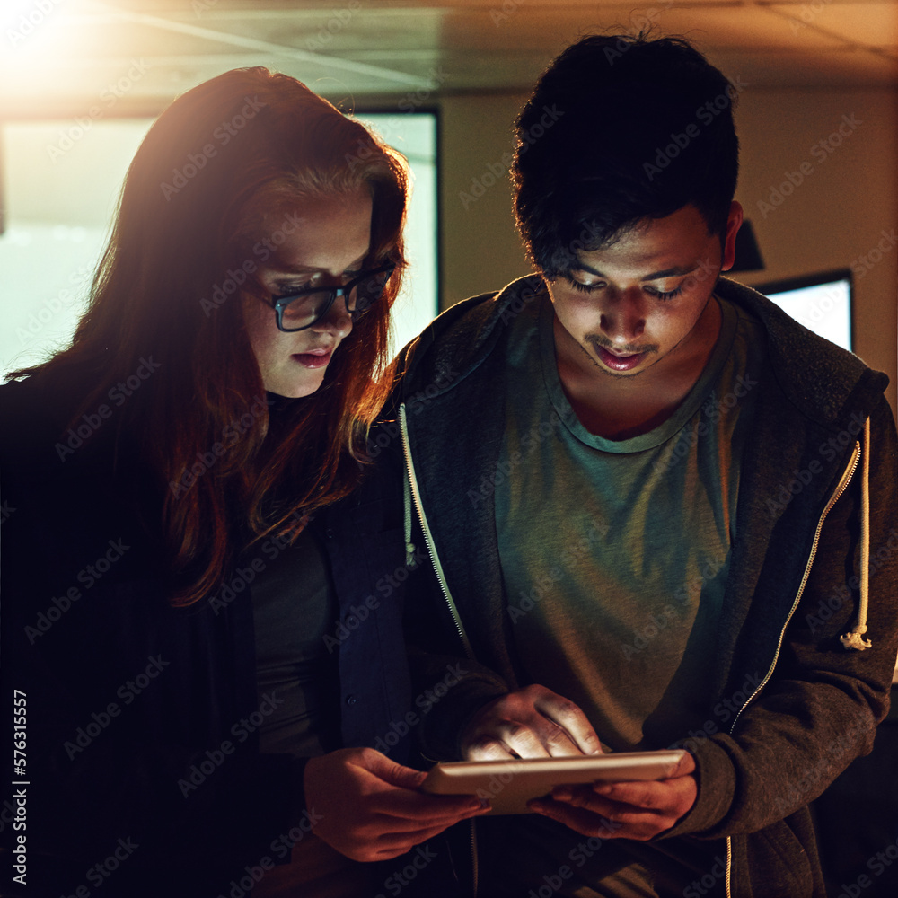 Poster planning, tablet and research with people in office at night for teamwork, web design and strategy. 
