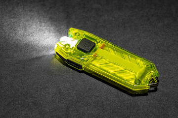 Modern aluminum LED Pocket Flashlight isolated on white background. 
