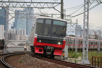 Fototapeta na wymiar 都市近郊を走行する名古屋鉄道