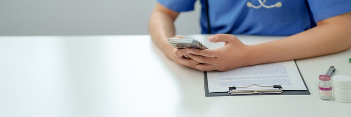 Fototapeta premium Medicine doctor using smartphone for Consultation Online.