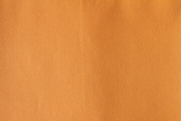 Orange paper texture background. Blank paper surface for designs.