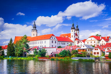 Naklejka premium Telc, Czech Republic. Small city in Moravia, world heritage. Sunny day with white beautiful clouds.