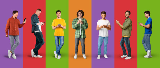 Smiling caucasian young men in casual typing on smartphone, play game, watch wideo