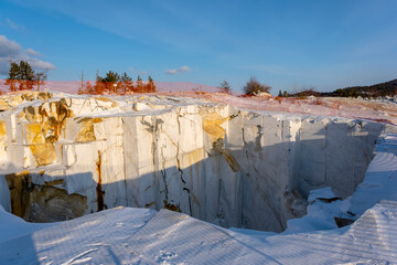 Abandoned marble quarry near the village of Buguldeyka on Lake Baikal in February, Russia