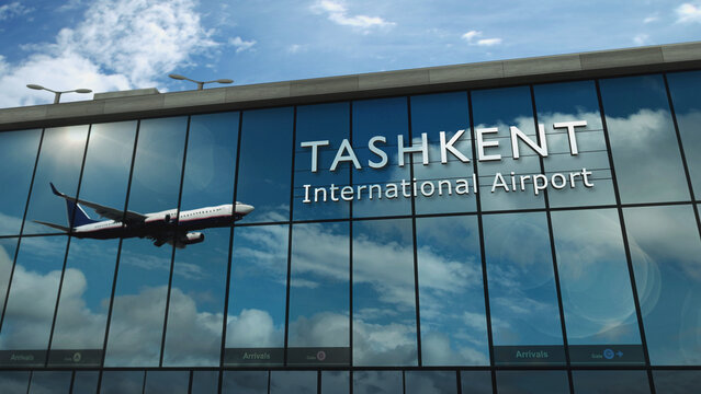 Airplane landing at Tashkent Uzbekistan airport mirrored in terminal