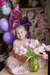 portrait of a girl with flowers and balloons