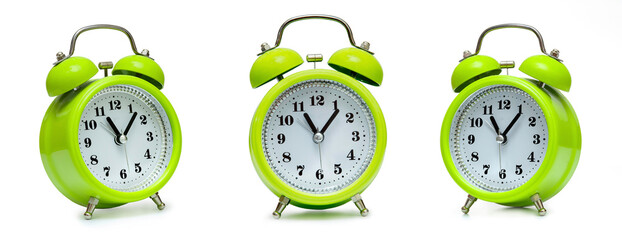 Green retro alarm clock in three angles on white background, isolate