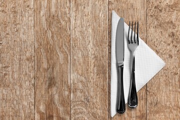 Cutlery set of fork and knife on desk