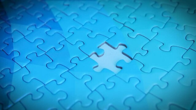 Person looking for empty place on picture from jigsaw puzzle to insert one last piece, integrity and interaction of economy, politics and science, which leads to prosperity and development of business