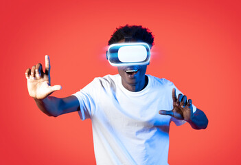 Amazed african american man, wearing high tech smart vr goggles