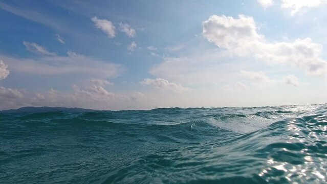 Close-up shot of tropical sea waves.. Blue sea surface with waves. Boracay, Philippines.