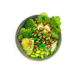 Combo with broccoli, avocado, edame beans and salad. Healthy green food. Top view on a white background.