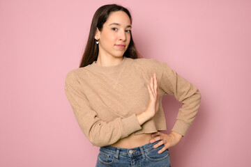 Photo portrait of young clueless girl showing enough no keeping distance isolated pink color background