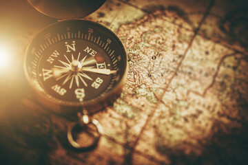 Compass and Paper Map Navigation Tools Closeup