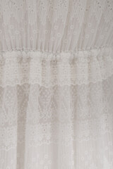 garment detail, white lace fabric