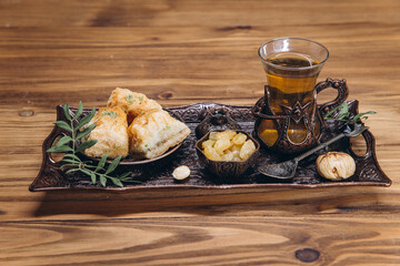 Ramadan table. Banner with traditional cup of tea, dishes and food sets