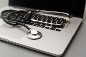 Stethoscope on a computer keyboard