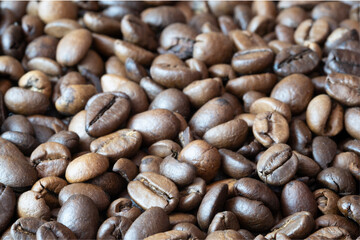 Roasted coffee beans, coffee beans, background.