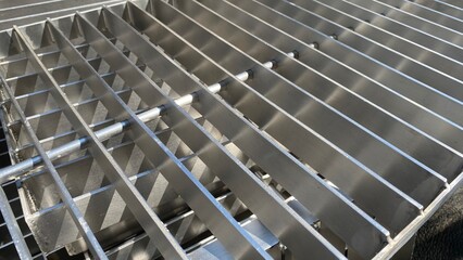 Obraz premium Stack of stainless steel flat bar of background. 
