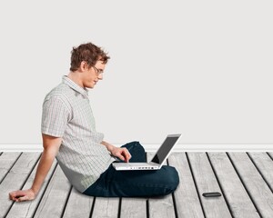 Young smart business man worker with laptop