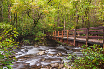 Walkway bridge over Little Pigeon River in the Pigeon Forge, Great Smoky Mountains national park, Tennessee, USA