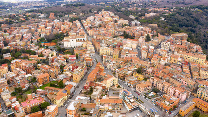 Aerial view of Genzano di Roma, a small town located in the Metropolitan City of Rome, Italy. The town is part of the Castelli Romani area.