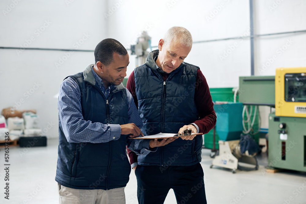 Aufkleber Supervising operations has never been easier. Shot of two factory managers doing a warehouse inspection.