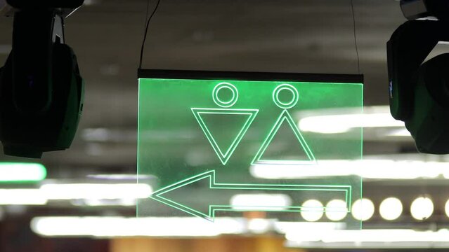 Entrance to toilets. Man and woman section. Toilet sign. Public place such as airport terminal, hospital, bus or train station and any other type. Entrance.