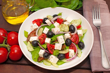 Greek salad with fresh vegetables closeup