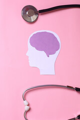 Seizure disorder, stroke, ADHD, world mental health day concept. Brain paper cutout with...