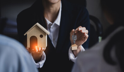Technology and financial advisory services concert. Business teamwork and working on digital laptop computer with advisor showing plan of investment to clients at table office. Digital marketing.