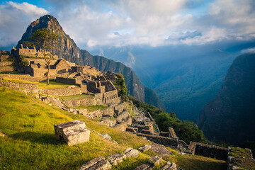 Fototapeta na wymiar Machu Picchu Sacred Inca Ruins, Peru, Sunny Valley, Aerial Drone Shot, Daylight over Latin American Indigenous Temple