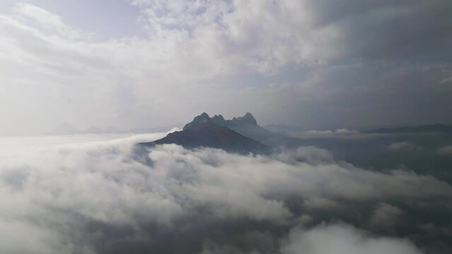 Drone video flight over clouds and mountains.4K video. Calp, Alicante, Spain