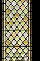 Antique multicolored medieval stained glass window panel in  Avignon, France - 576386179