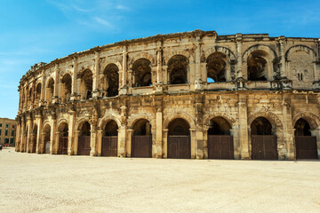 Arena of Nimes, famous ancient Roman Empire amphitheater in Nimes, Occitanie region, Southern France - 576386319
