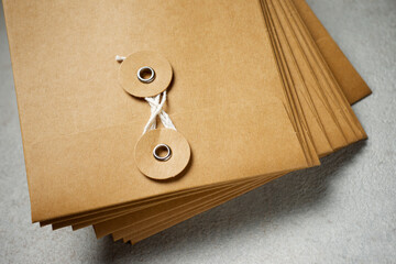 Vintage cardboard envelopes with string closure