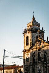 Fototapeta na wymiar View of the Igreja do Carmo tower of the 18th century Igreja dos Carmelitas at sunset, Porto ,Portugal