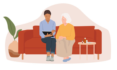 Old woman and home care worker. Nurse explaining her medication.