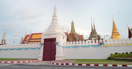 Temple of the Emerald Buddha or Wat Phra Kaew temple view from outside, Historic place in Bangkok, Thailand