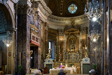 Fototapeta na wymiar The altar of the baroque church of Santa Maria in Via , Rome, Italy 