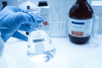 Ethyl ether in glass, chemical in the laboratory and industry