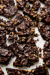 chocolate cracknell a firm, crunchy dessert of cornflakes, cocoa and butter with golden syrup 