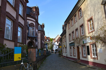Fototapeta na wymiar Street in the old town in Freiburg im Breisgau, Black Forest, Germany