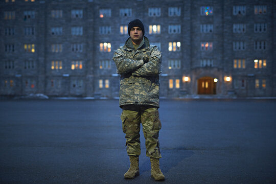 Today a cadet, tomorrow a colonel. Shot of a young soldier standing outside on a cold day at military school.