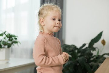 Cochlear implant system. Installation cochlear implant on child girl ear for restores hearing. Kid...