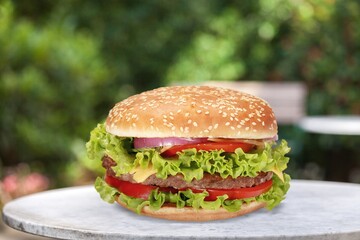 Delicious Beef Burger with Cheese in a desk