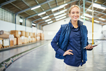 Digital devices have made inventory a breeze. Shot of a young woman working in a warehouse.
